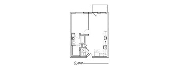 A floor plan of a small apartment with one bedroom and a living area.