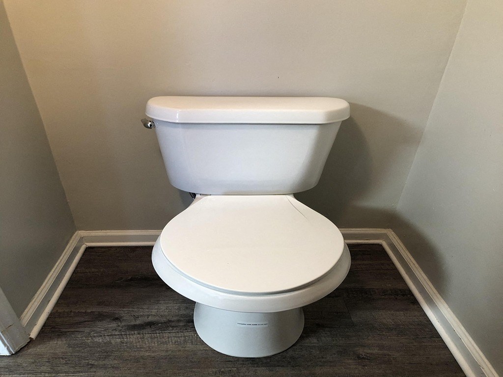 a small bathroom with a toilet in it