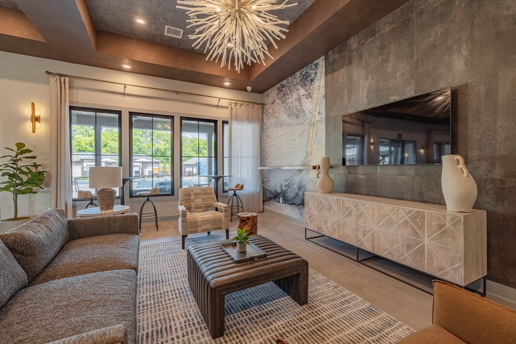 Clubroom With TV at Evolve at Parkway Apartment Homes, North Carolina