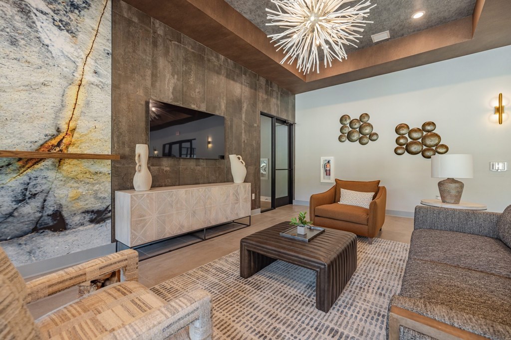 Lounge Area With TV at Evolve at Parkway Apartment Homes, Concord