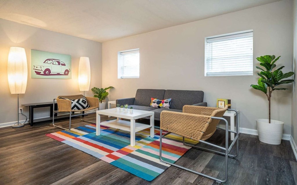 a living room with a couch and a coffee table at Viceroy Apartments, Durham
