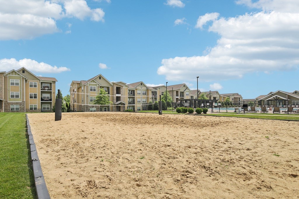 A sandy area in front of apartment buildings at Venue at 109 Apartments, Lebanon , TN