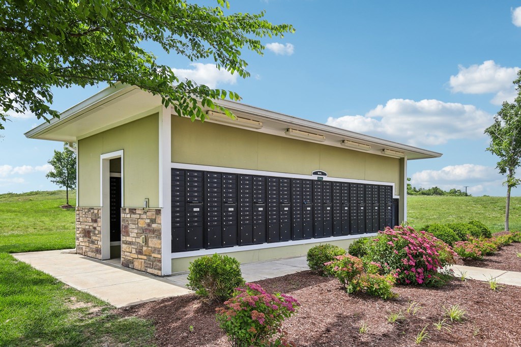 A small building with a row of plaques on the wall at Venue at 109 Apartments, Tennessee, 37090