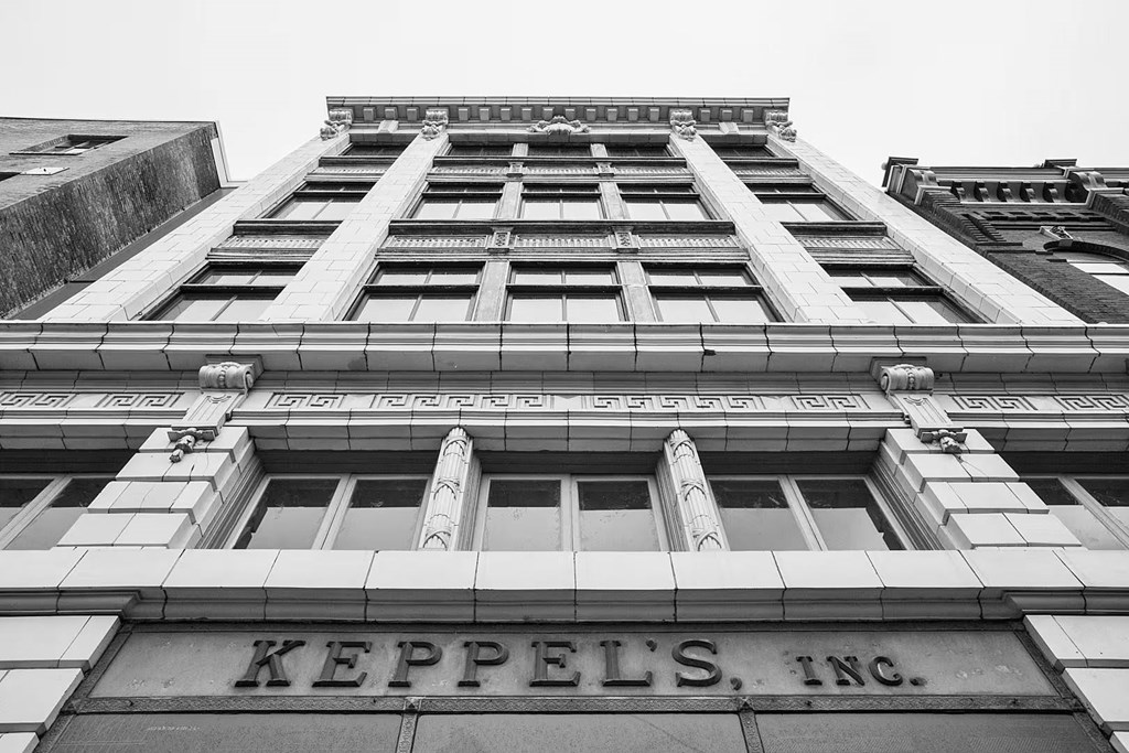 A tall building with the words "Keppels, Inc." on the front.