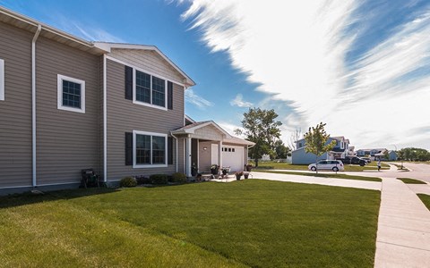 a row of houses on the side of a street