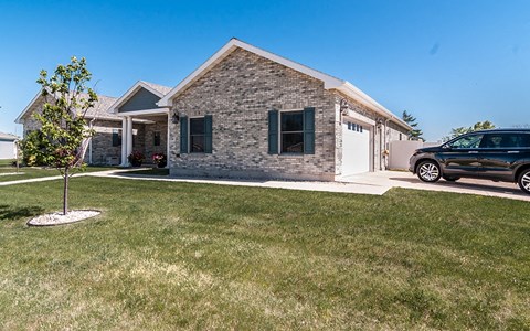 a house with a car parked in front of it
