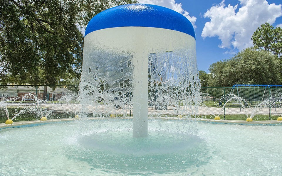a water fountain with a blue and white tower