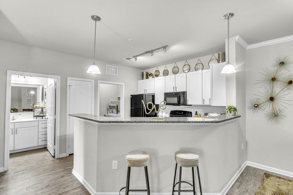 Kitchen with a bar area at Sterling Creek at Richmond Hill, Georgia 