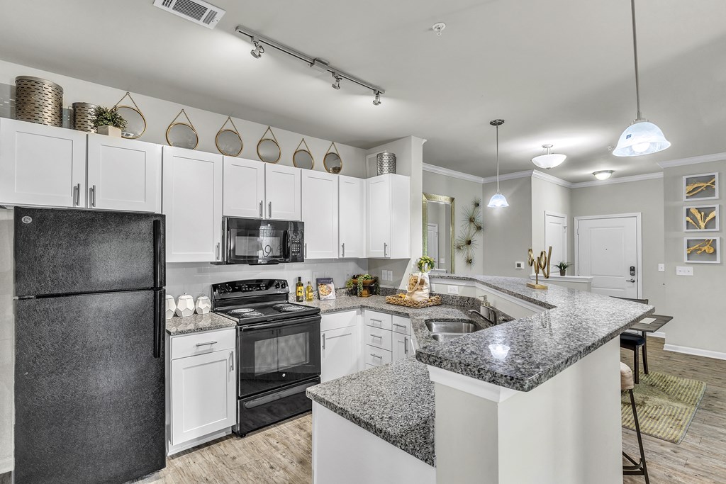 Eat-In Kitchen Table With Sink at Sterling Creek at Richmond Hill, Richmond Hill, GA, Georgia , 31324