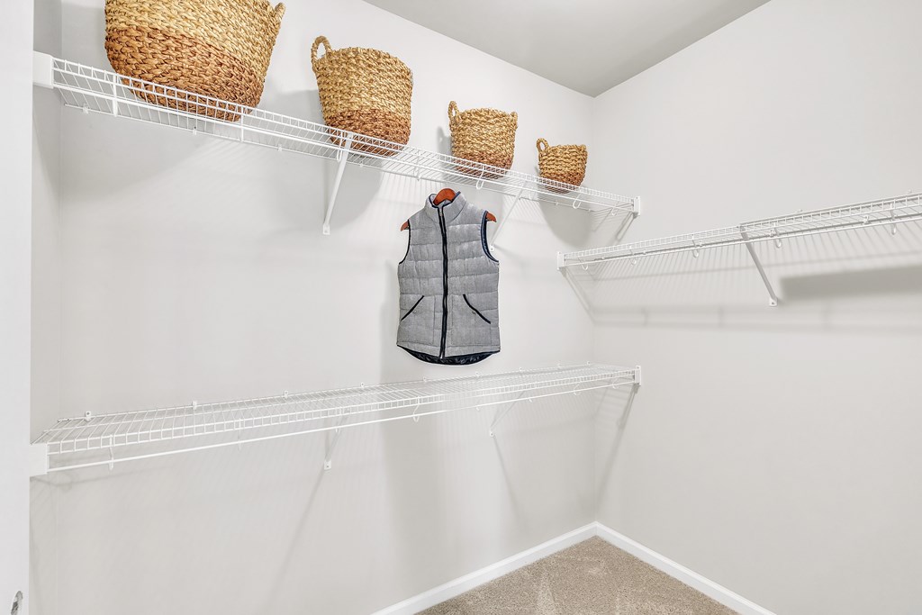 Walk-In Closets With Built-In Shelving at Sterling Creek at Richmond Hill, Richmond Hill, GA