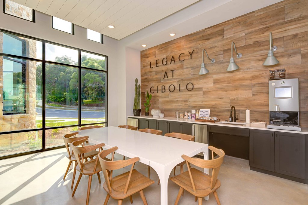 a dining room with a white table and chairs at Legacy at Cibolo, Texas