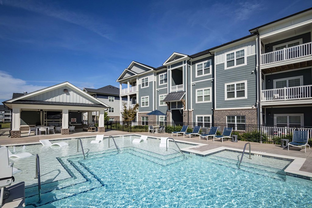 A large swimming pool in front of apartment at Waterleaf at Neely Ferry Apartments, South Carolina 29680