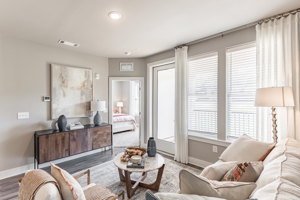 Living Room With Plenty Of Natural Light at Prosper Madison Oaks, Madison, AL 35758