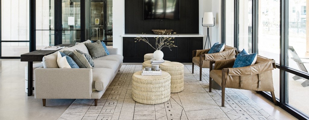 a living room with a couch and chairs and a table at Legacy at Cibolo, Texas