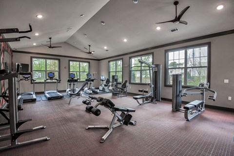 a gym with exercise equipment and windows a gym with exercise equipment and windows at Sterling Creek, Richmond Hill, 31324