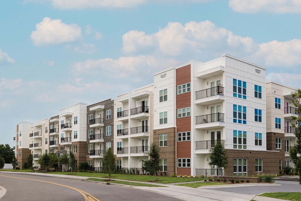 Apartment building with balconies and multiple stories at Hudson at Renaissance Apartments, Wilmington, North Carolina