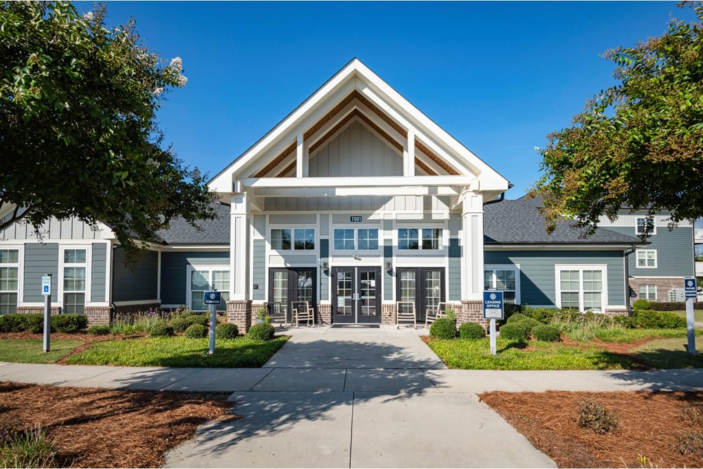 A large building with a triangular roof A large building with a triangular roof at Waterleaf at Neely Ferry Apartments, South Carolina