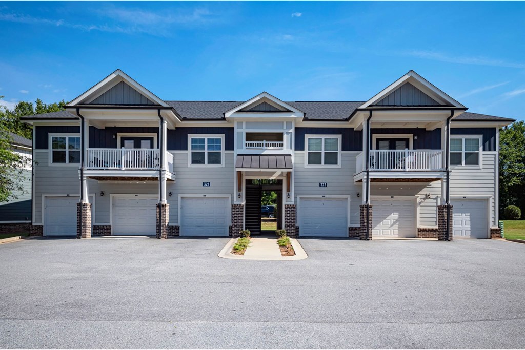 A row of houses with garages and driveways at Waterleaf at Neely Ferry Apartments, Simpsonville, South Carolina