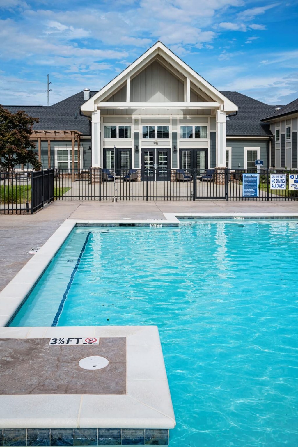 A swimming pool in front of a house at Waterleaf at Neely Ferry Apartments, South Carolina