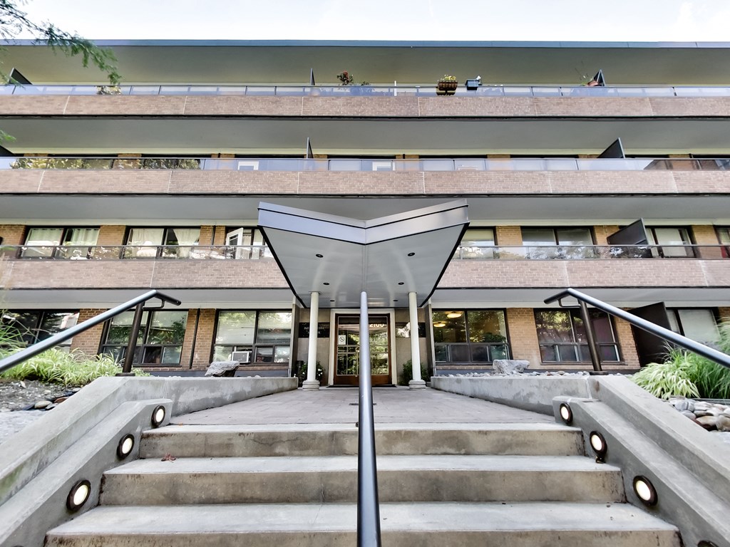 a view of the front of a building with stairs