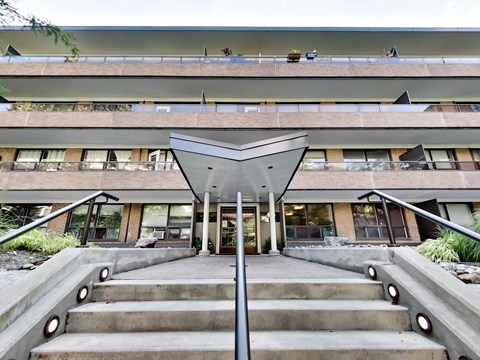a view of the front of a building with stairs