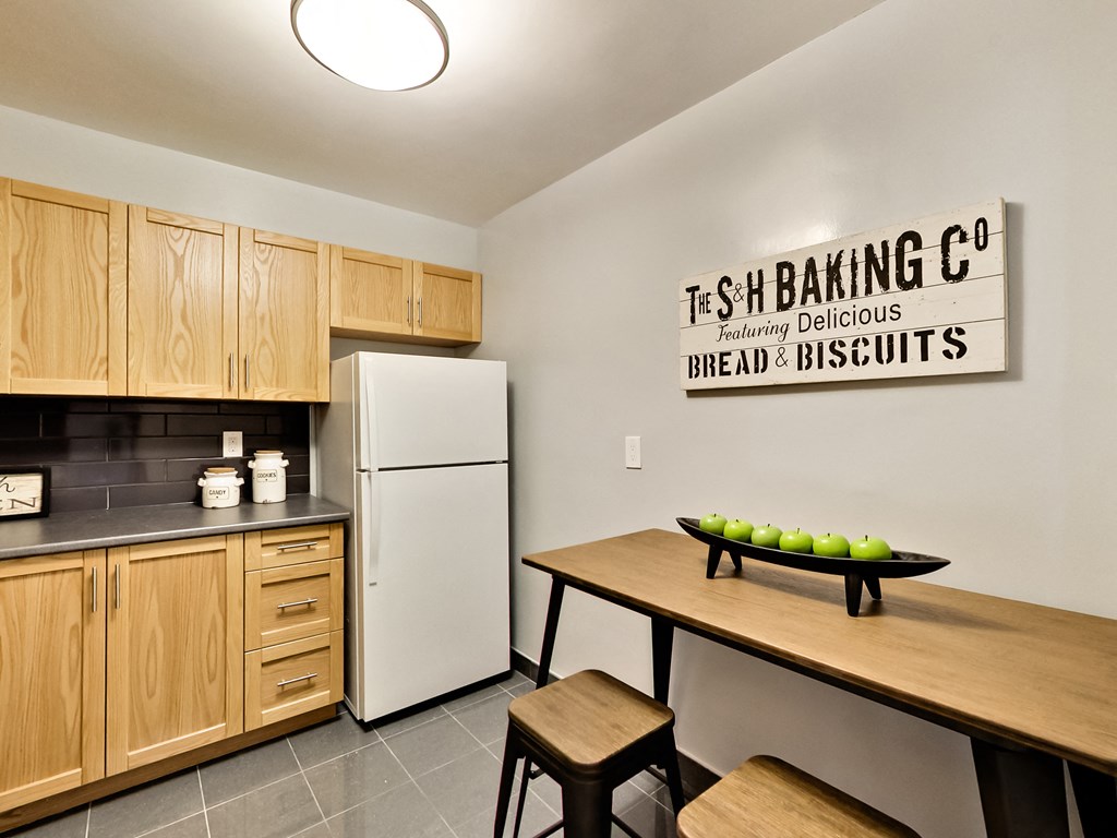 A kitchen with a sign that says