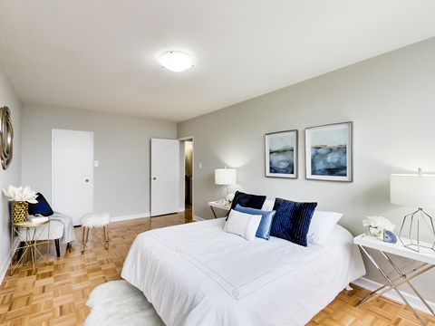 a patient room with two beds and a sign on the wall