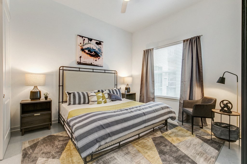 a bedroom with a bed and a wallpaper of a bed