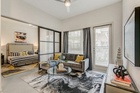 a living room with a couch and a coffee table
