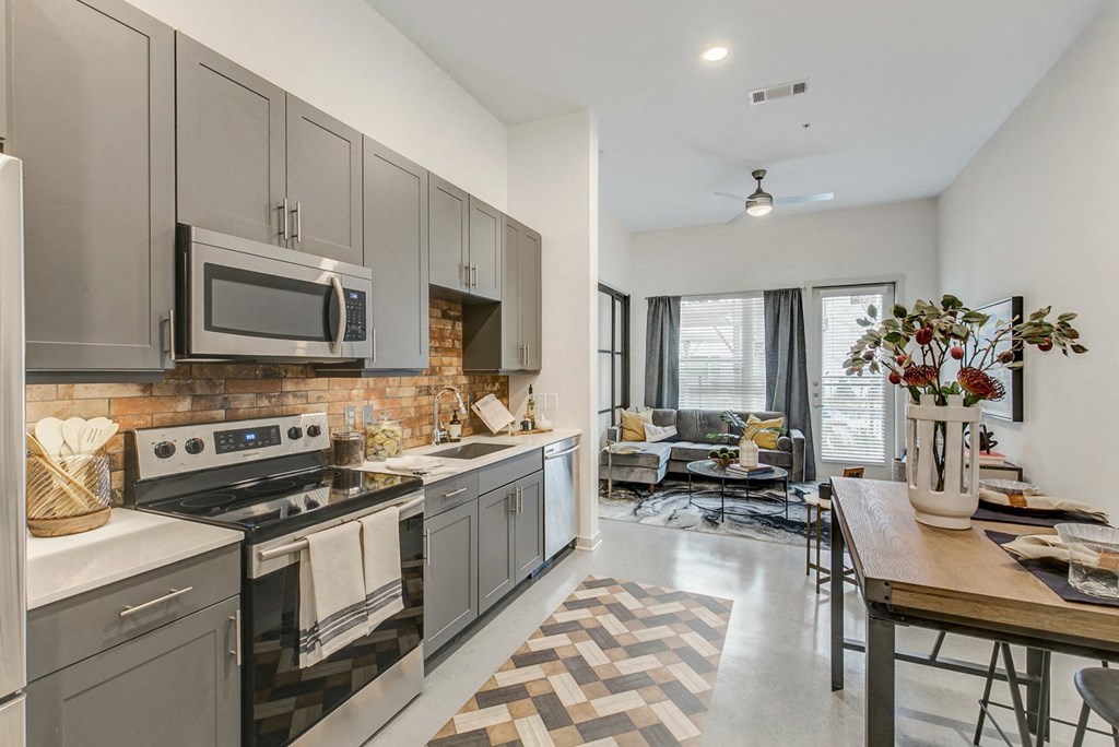 a view of a kitchen and living room from above