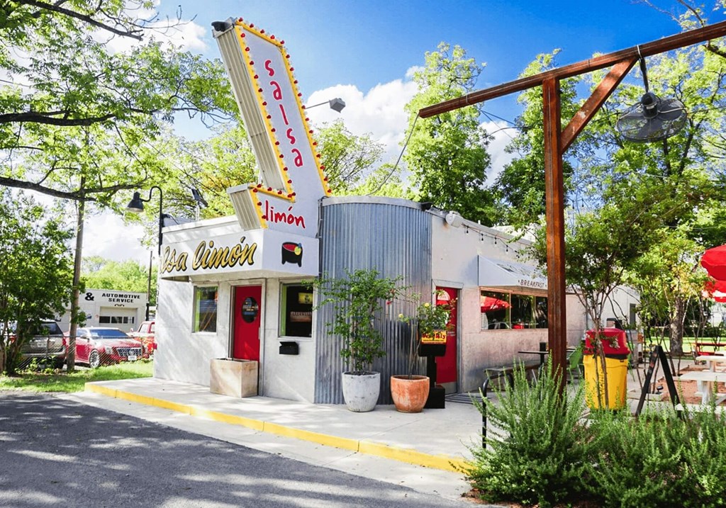 a diner with a sign on the side of a building