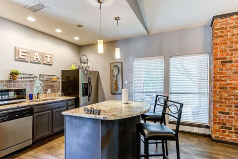 a kitchen with a counter top and a sink