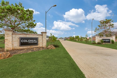 the subdivision is located on the side of a road with a street sign
