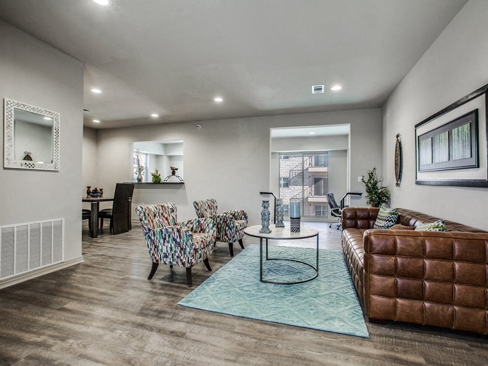 a living room with a couch and a table