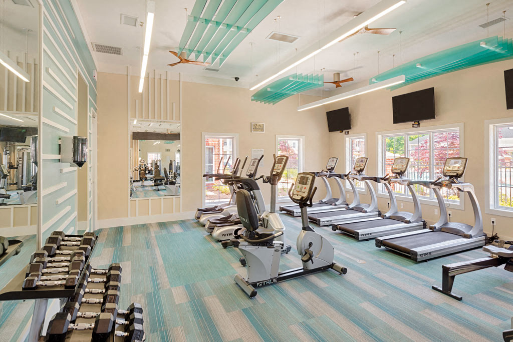 Fitness center with cardio equipment; free weights; flat screen TVs