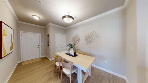 a separate dining space with a chandelier