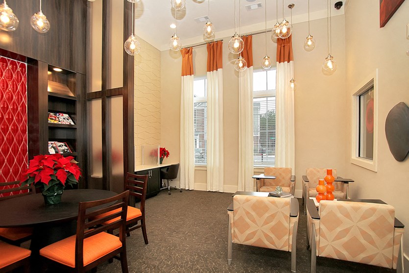 Resident clubhouse with tables and chairs; work space