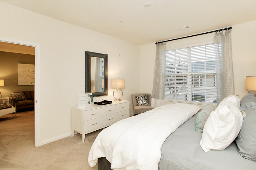 Bedroom with window; door to living room