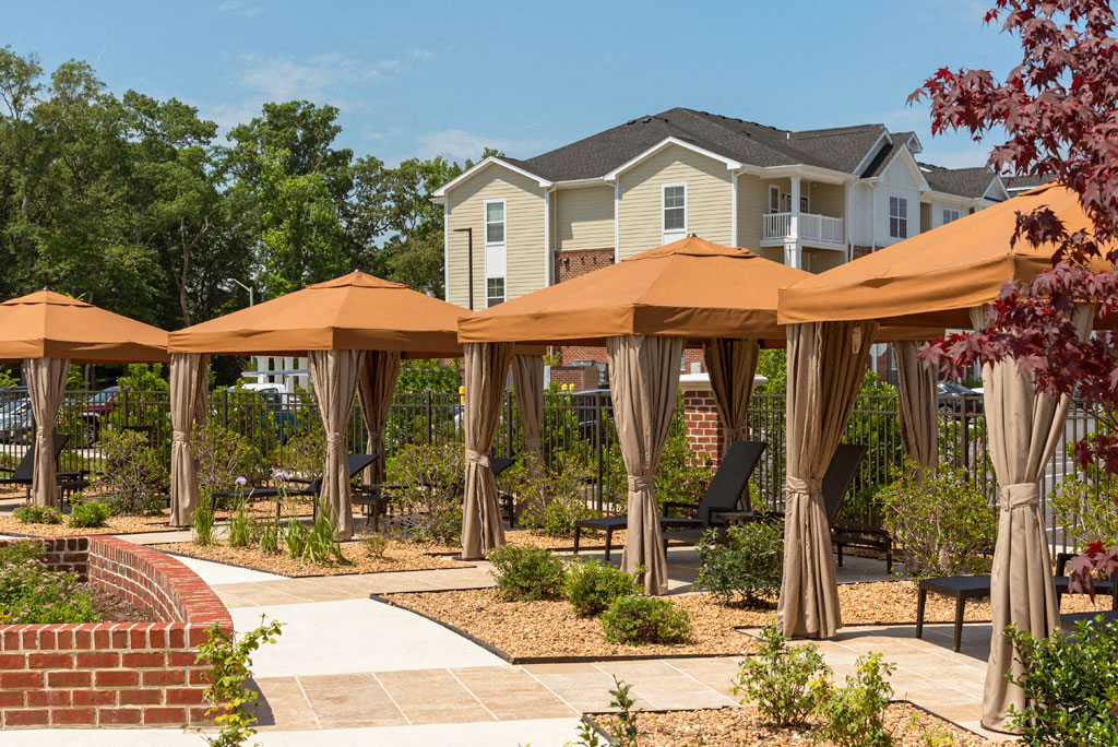 Cabanas with chairs at the pool