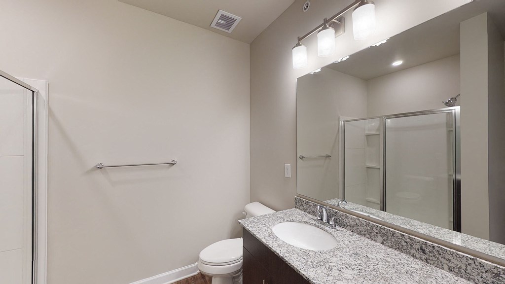 Bathroom with dual sinks, shower