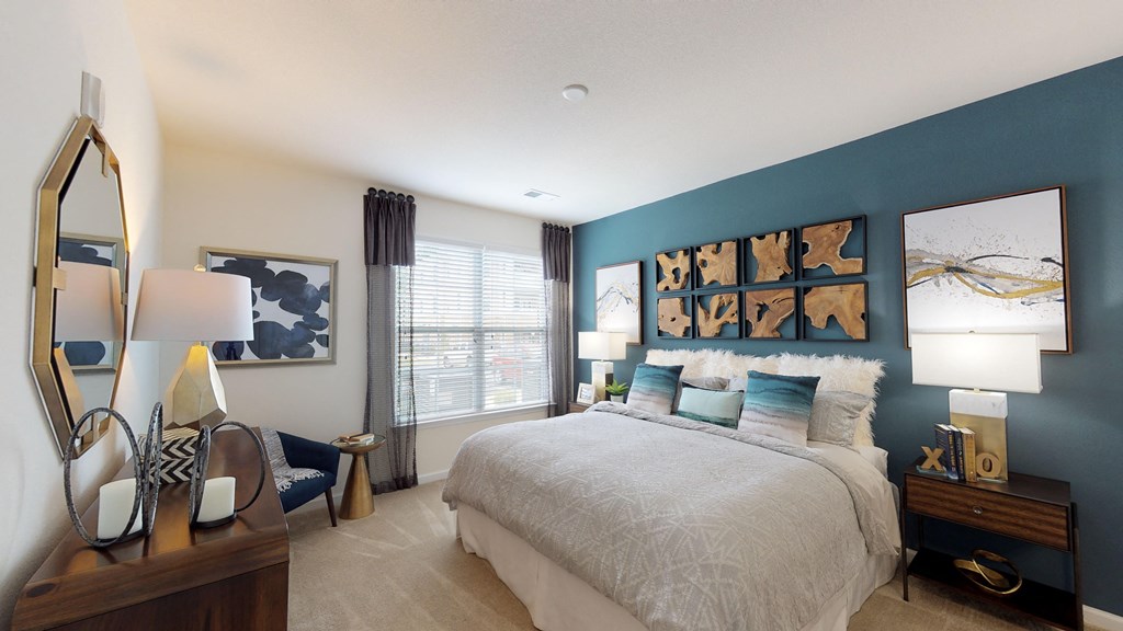 Bedroom with window; carpet