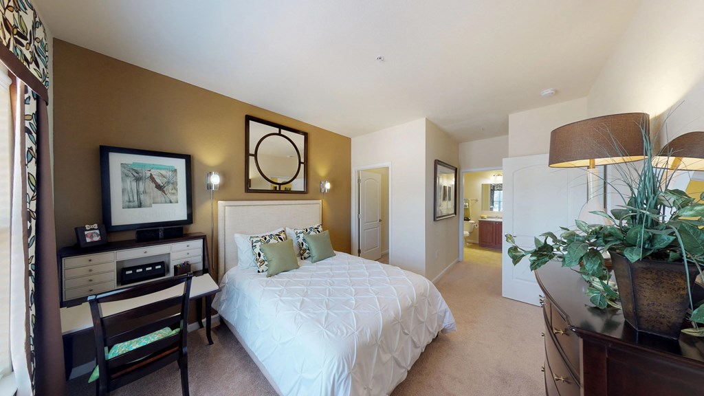 Bedroom with closet; doorway to bathroom