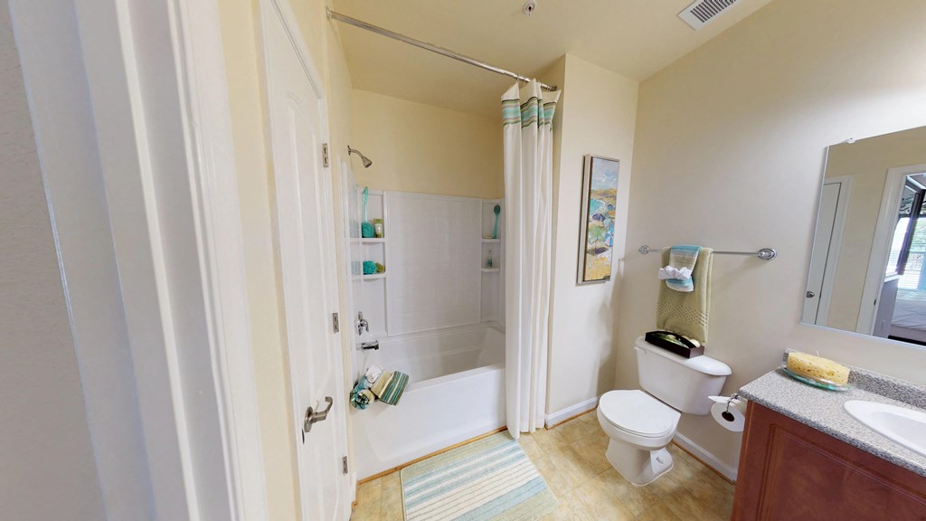 Bathroom with sink, toilet, shower and tub