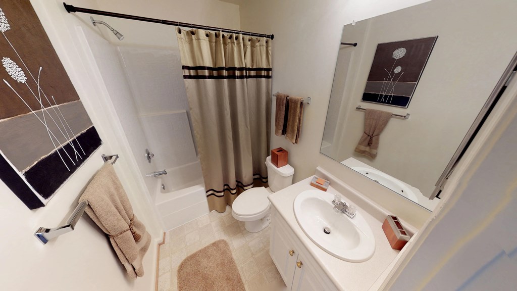 Bathroom with sink, toilet, shower and tub