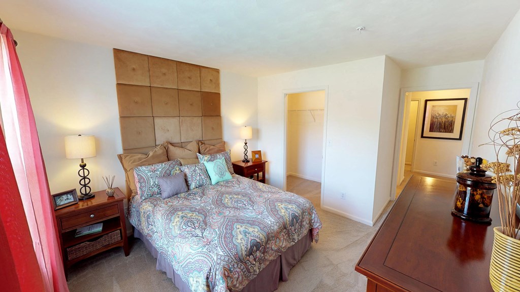 Bedroom with closet; hallway bathroom