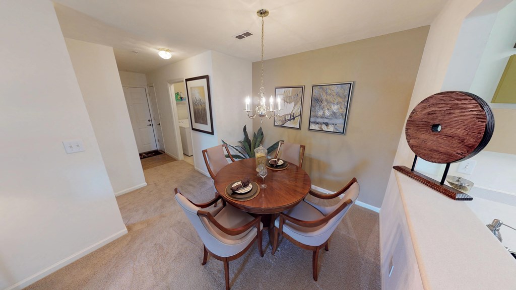 Dining room next to entryway and front door