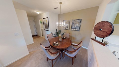 Dining room next to entryway and front door