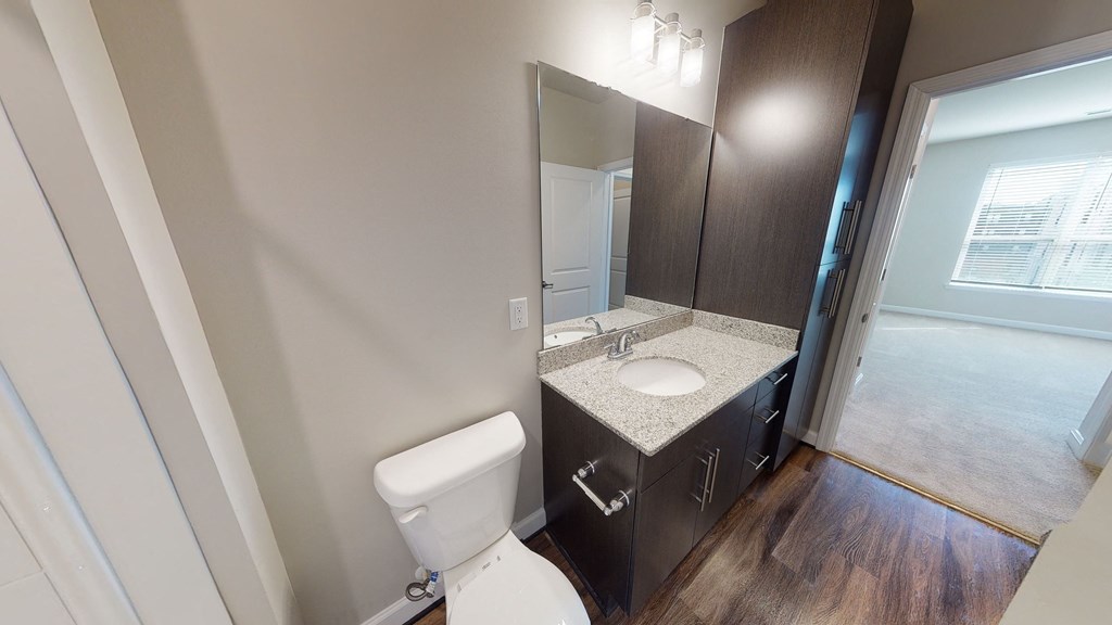 Bathroom with sink, toilet, shower and tub