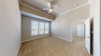 Living room with carpet; ceiling fan; open to ktichen - Photo Gallery 39