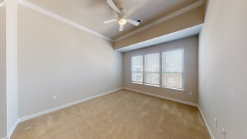 Living room with carpet; ceiling fan; open to ktichen - Photo Gallery 41